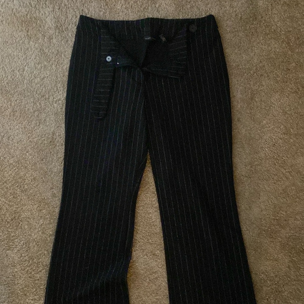 Black dress pants with white stripes